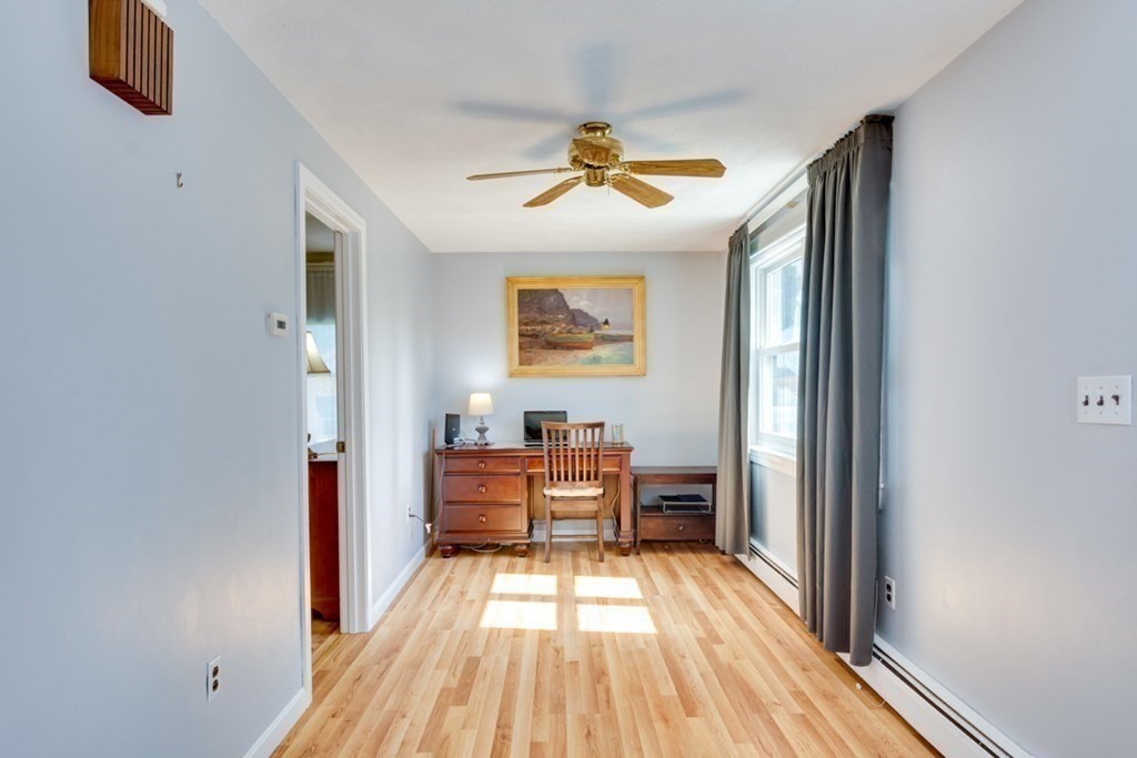 29 Anna Road Woburn, MA 01801 - Photo 15 of 29 a view of a livingroom with wooden floor and furniture