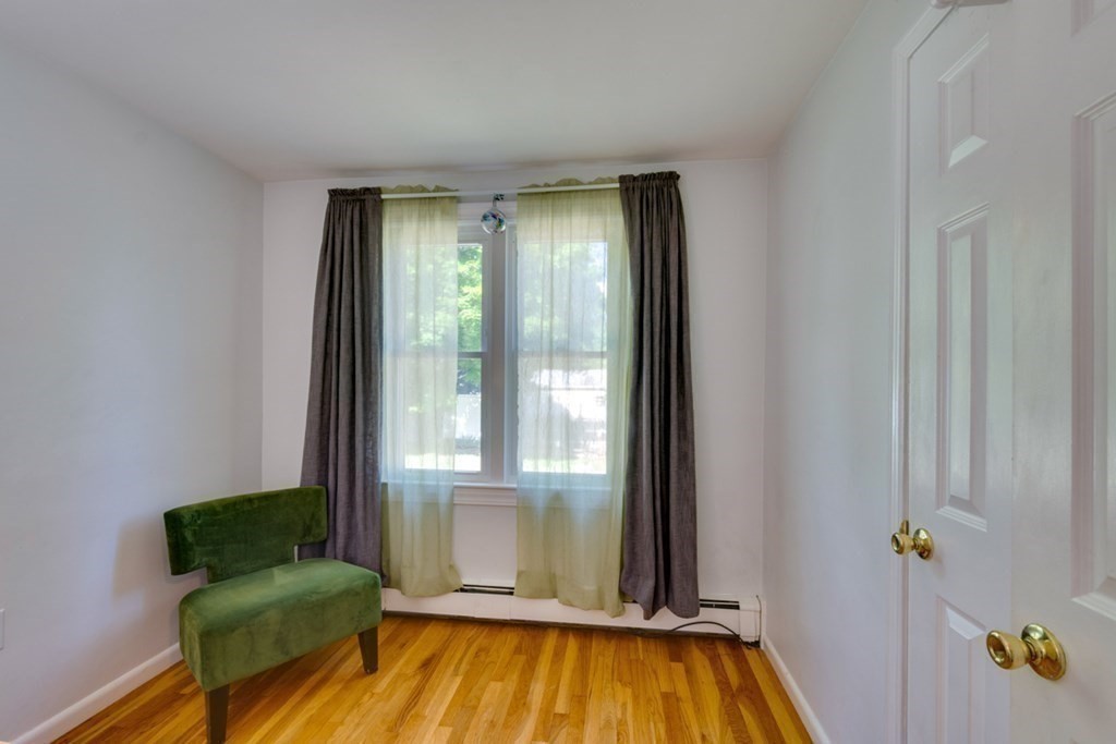 29 Anna Road Woburn, MA 01801 - Photo 18 of 29 a living room with furniture and a window