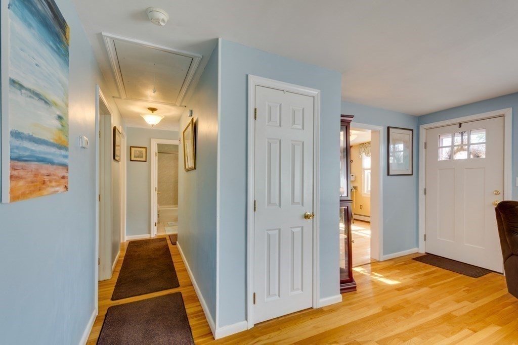 29 Anna Road Woburn, MA 01801 - Photo 19 of 29 a view of a bedroom with wooden floor and windows
