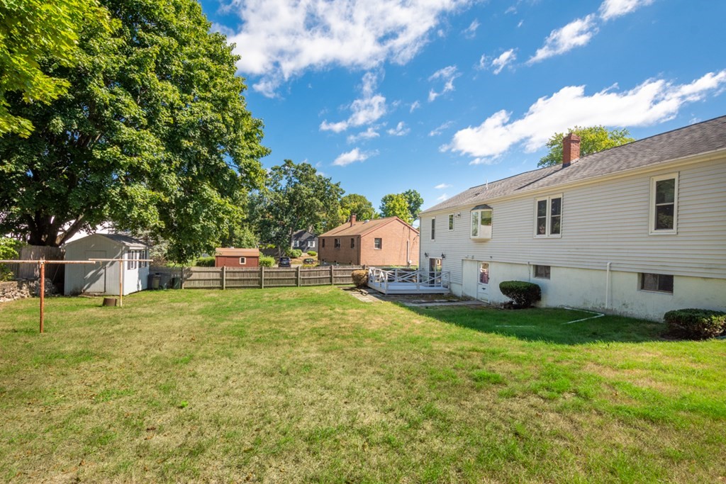 29 Anna Road Woburn, MA 01801 - Photo 26 of 29 a house view with a garden space