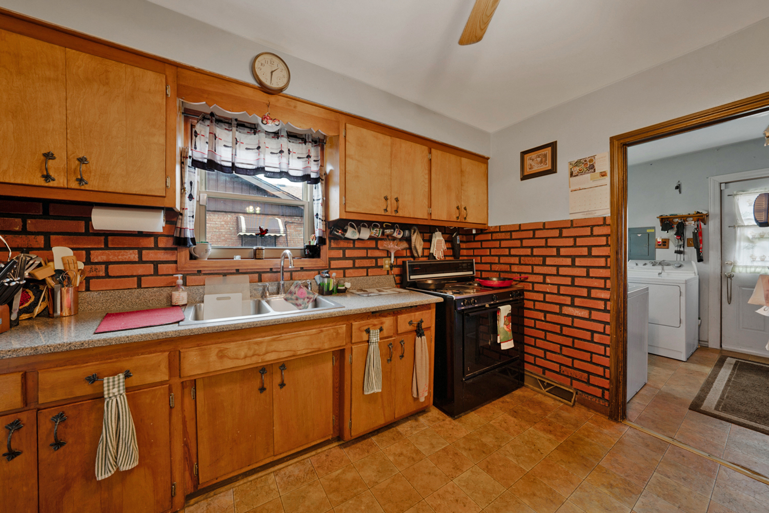 10943 Princess Avenue Chicago Ridge, IL 60415 - Photo 7 of 18 a kitchen with stainless steel appliances granite countertop a stove and cabinets