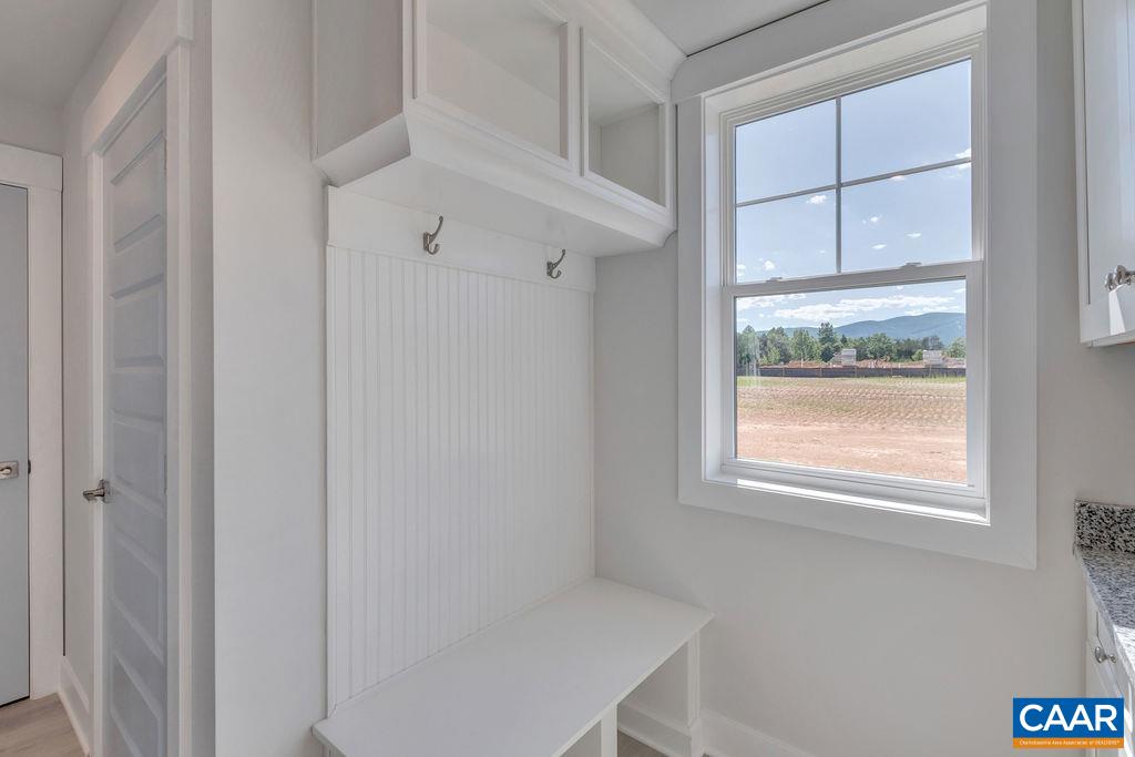 466 Claibourne Road Crozet, VA 22932 - Photo 16 of 39 a bathroom with a window and a shower
