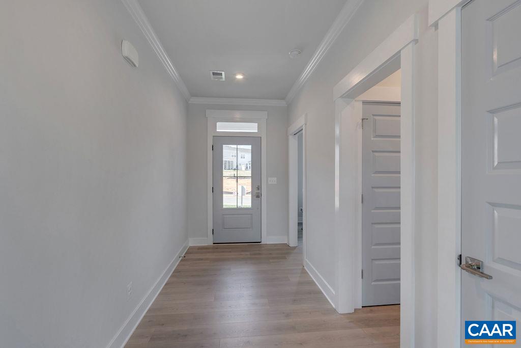 466 Claibourne Road Crozet, VA 22932 - Photo 18 of 39 a view of a hallway with wooden floor and closet