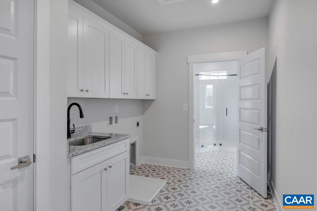 466 Claibourne Road Crozet, VA 22932 - Photo 30 of 39 a view of a sink and a refrigerator