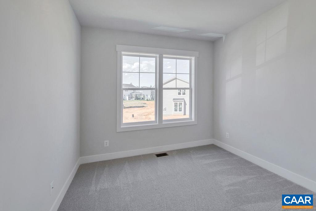 466 Claibourne Road Crozet, VA 22932 - Photo 32 of 39 an empty room with a window