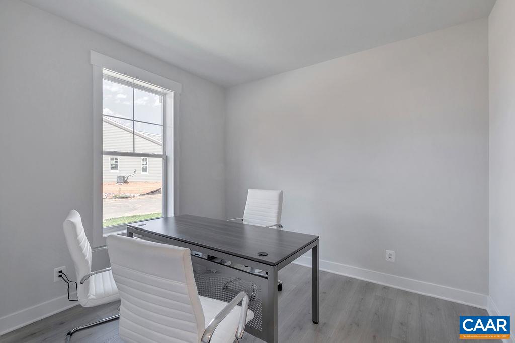 466 Claibourne Road Crozet, VA 22932 - Photo 6 of 39 a view of a workspace with furniture and a window
