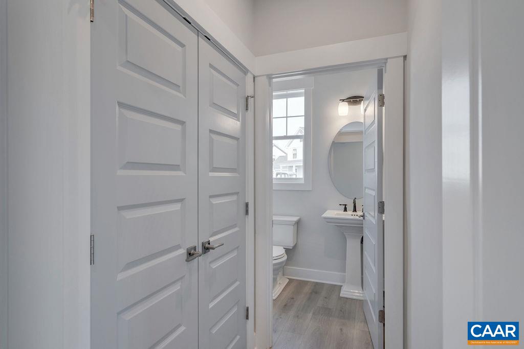 466 Claibourne Road Crozet, VA 22932 - Photo 7 of 39 walk in closet with wooden floor