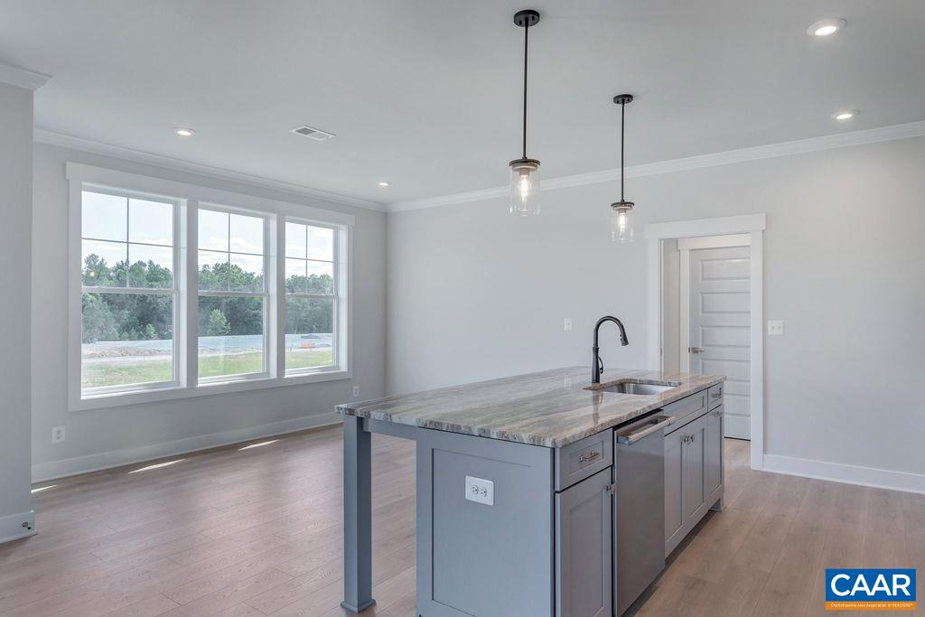 466 Claibourne Road Crozet, VA 22932 - Photo 9 of 39 a kitchen with a sink stove and a counter top space