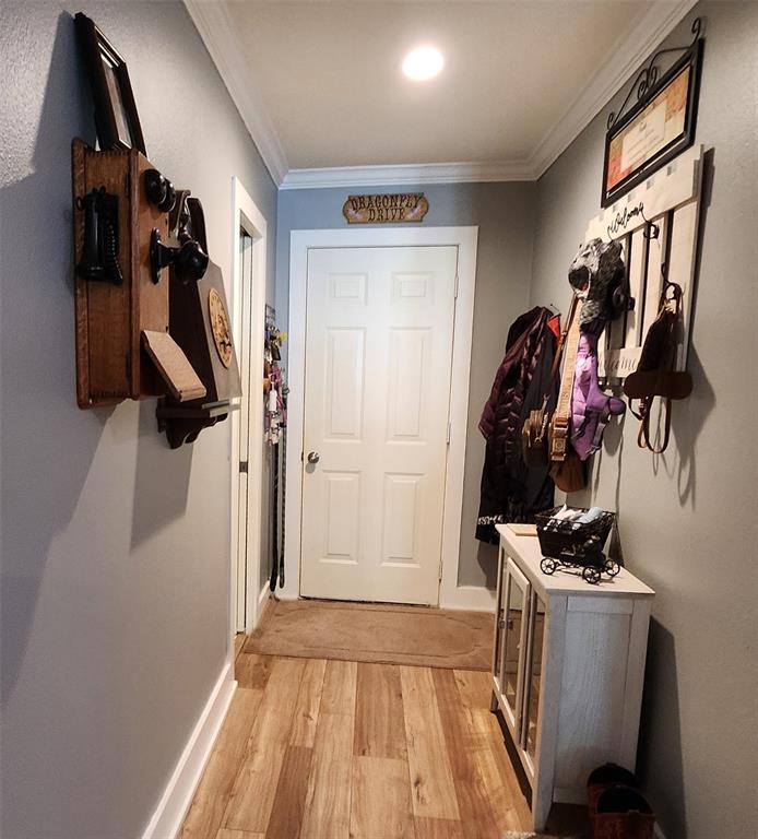 1023 Ridgefield Drive Plano, TX 75075 - Photo 18 of 39 a view of walk in closet with clothes and shoes