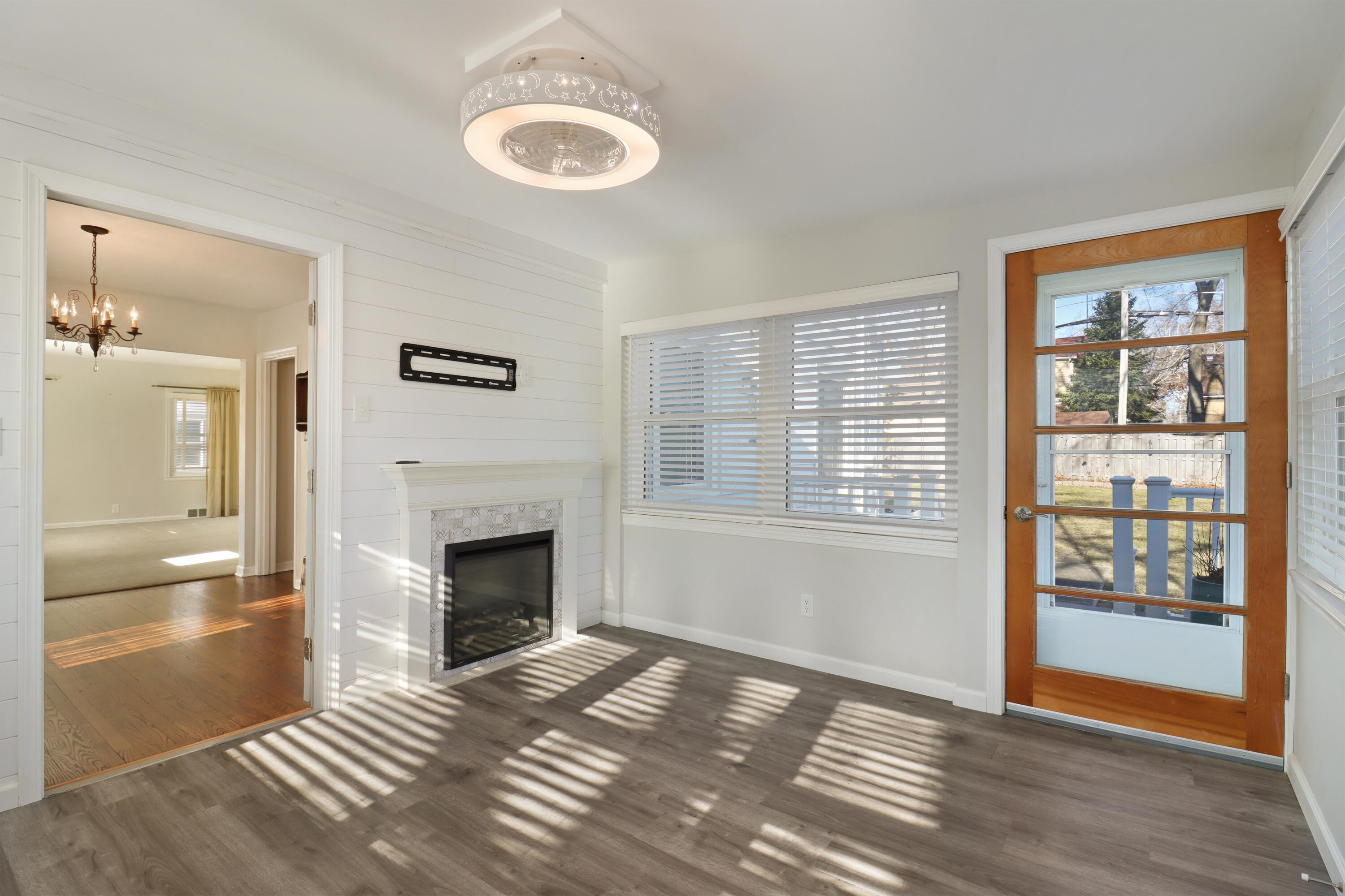 4320 Wilson Road Kenosha, WI 53142 - Photo 10 of 33 Sunroom with Electric Fireplace