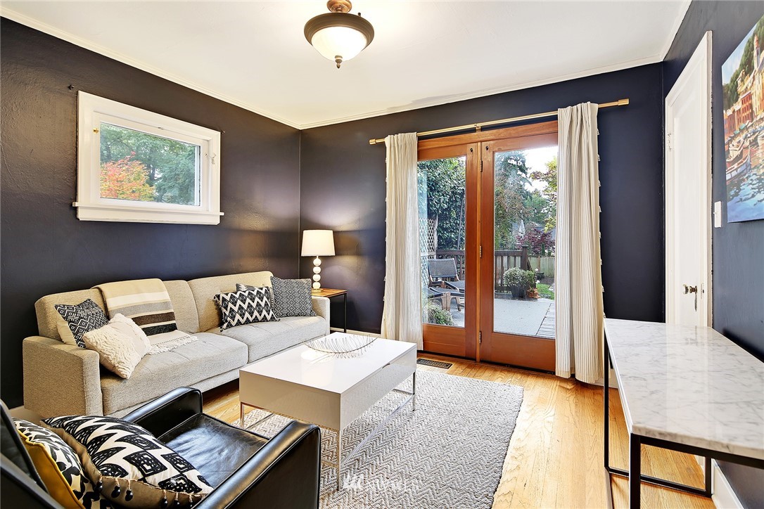1039 Northeast 91st Street Seattle, WA 98115 - Photo 9 of 25 a living room with furniture and a large window