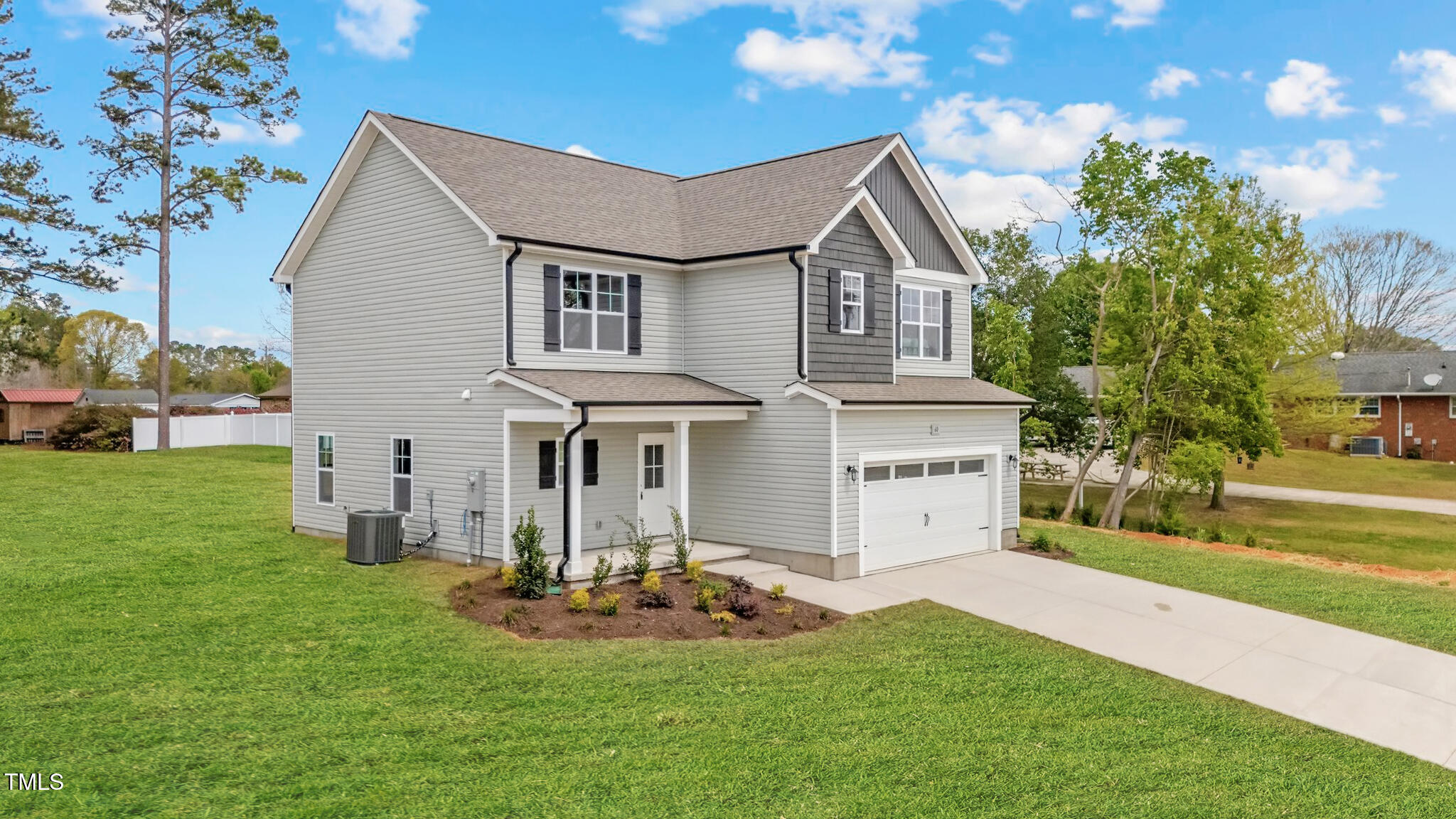 60 Bennett Road Coats, NC 27521 - Photo 2 of 39 2-web-or-mls-DJI_20250404132627_0207_D