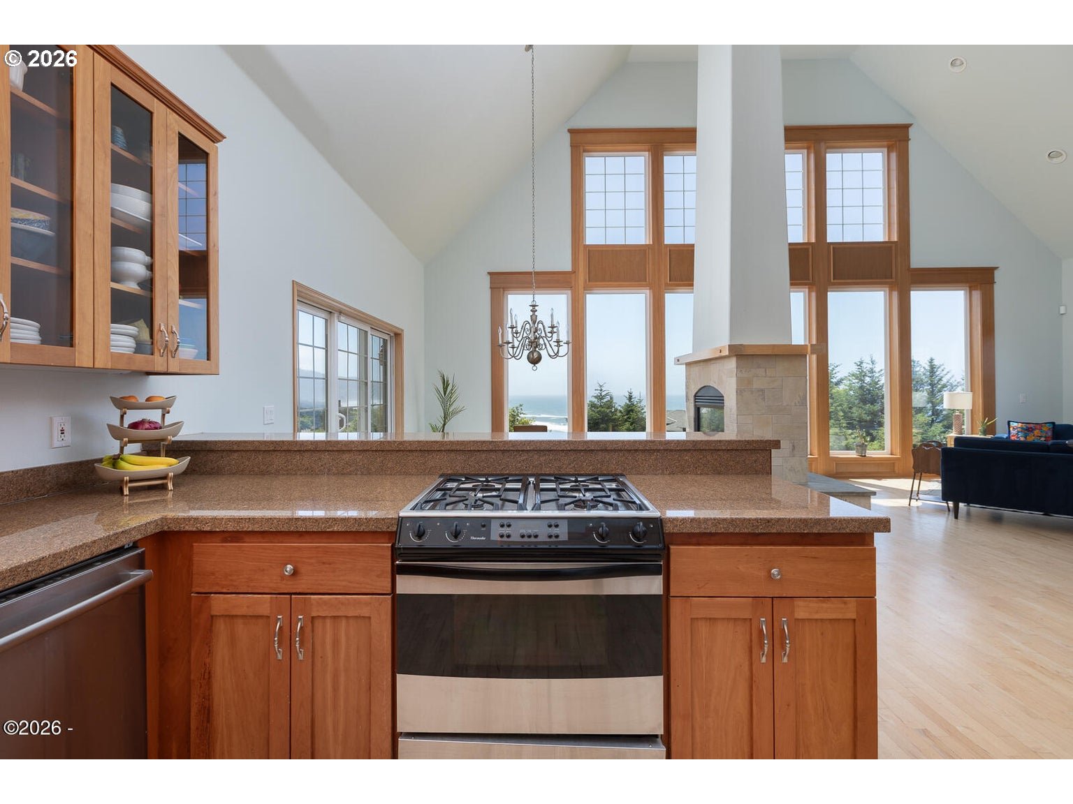 5340 Haystack Drive Neskowin, OR 97149 - Photo 13 of 48 a kitchen with stainless steel appliances granite countertop a stove a sink and a granite counter tops