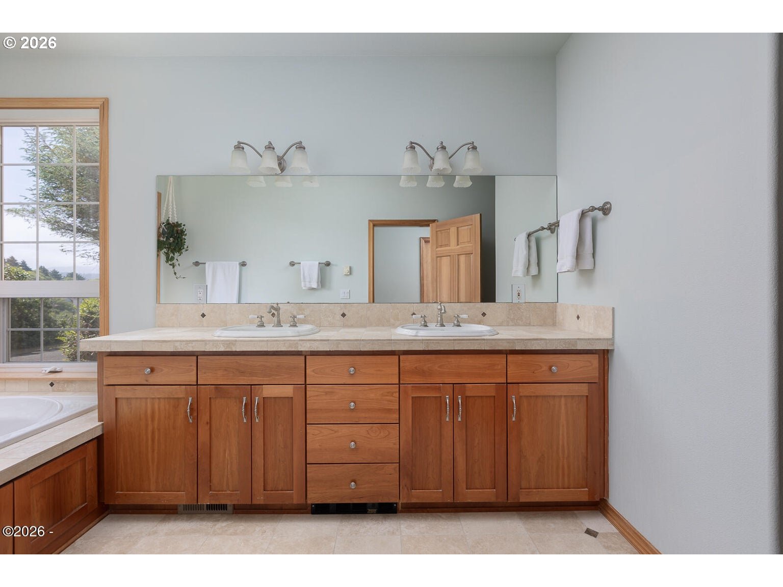 5340 Haystack Drive Neskowin, OR 97149 - Photo 17 of 48 a bathroom with a sink and a mirror
