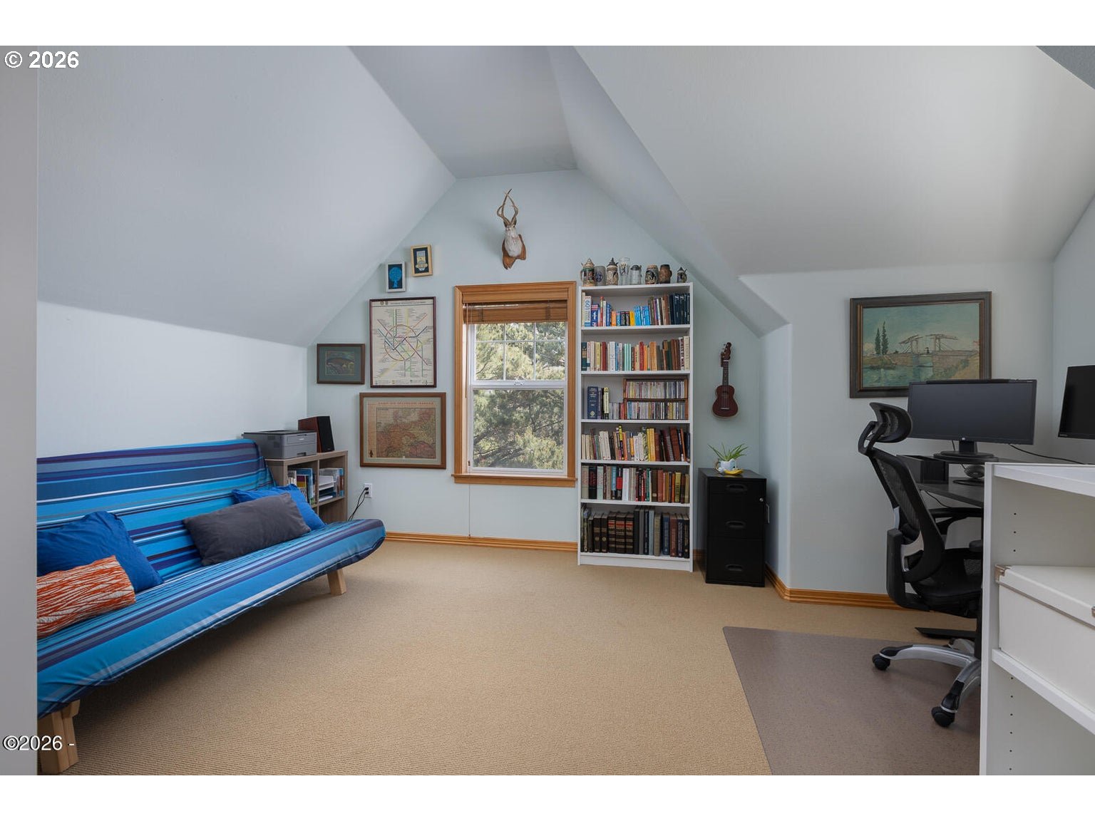 5340 Haystack Drive Neskowin, OR 97149 - Photo 30 of 48 a living room with furniture and a book shelf