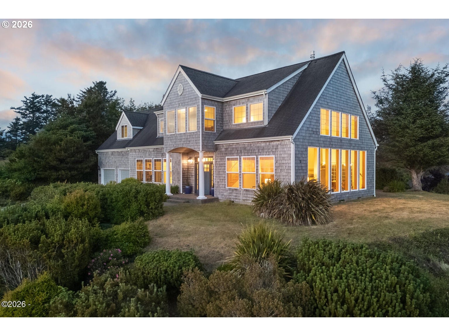 5340 Haystack Drive Neskowin, OR 97149 - Photo 3 of 48 a front view of a house with a yard