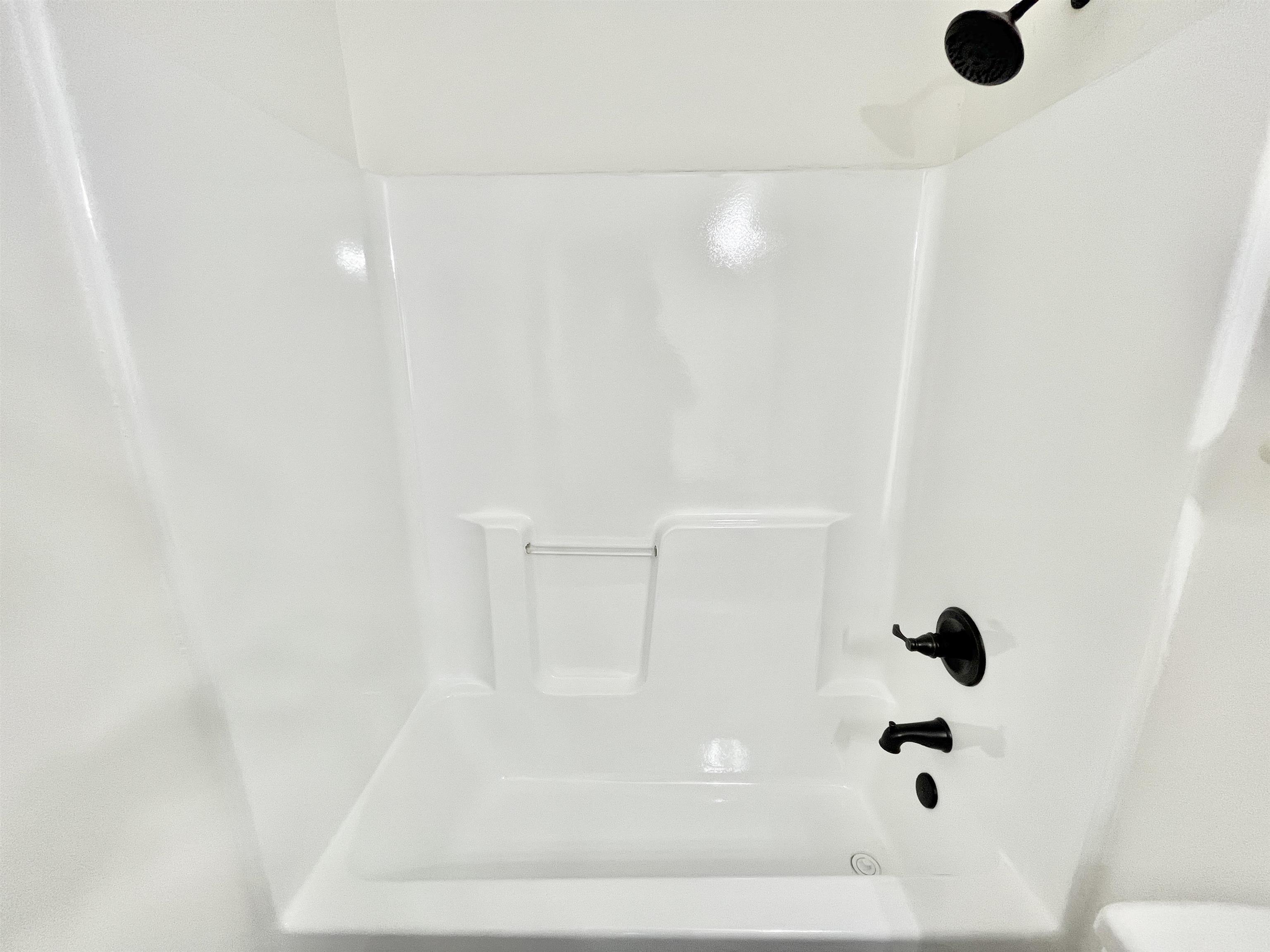 4769 Gilbert Road Memphis, TN 38116 - Photo 16 of 29 a bathroom with a shower