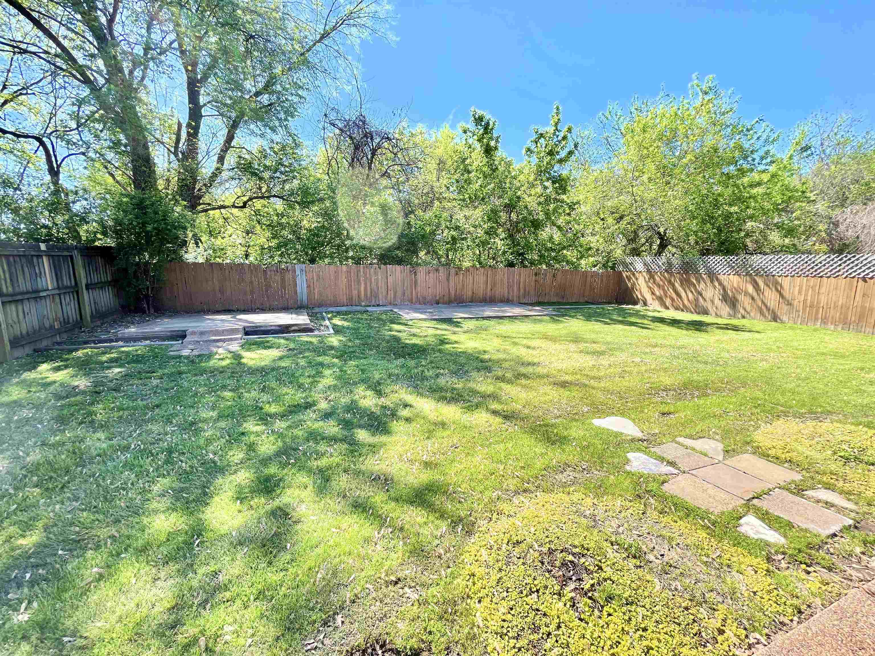4769 Gilbert Road Memphis, TN 38116 - Photo 3 of 29 a backyard of a house with lots of green space