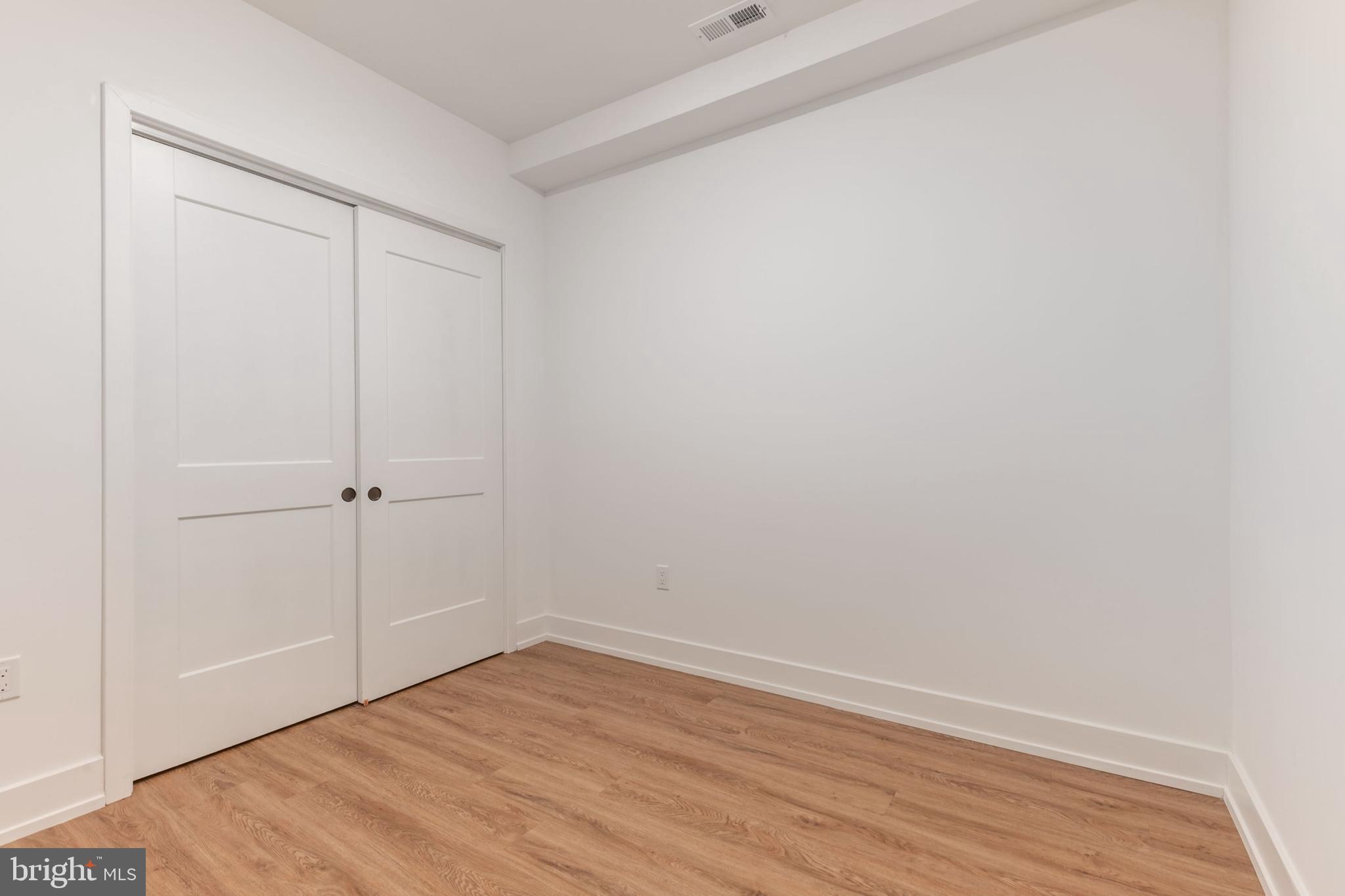 1519 Ridge Avenue, Unit 503 Philadelphia, PA 19130 - Photo 28 of 40 wooden floor in an empty room