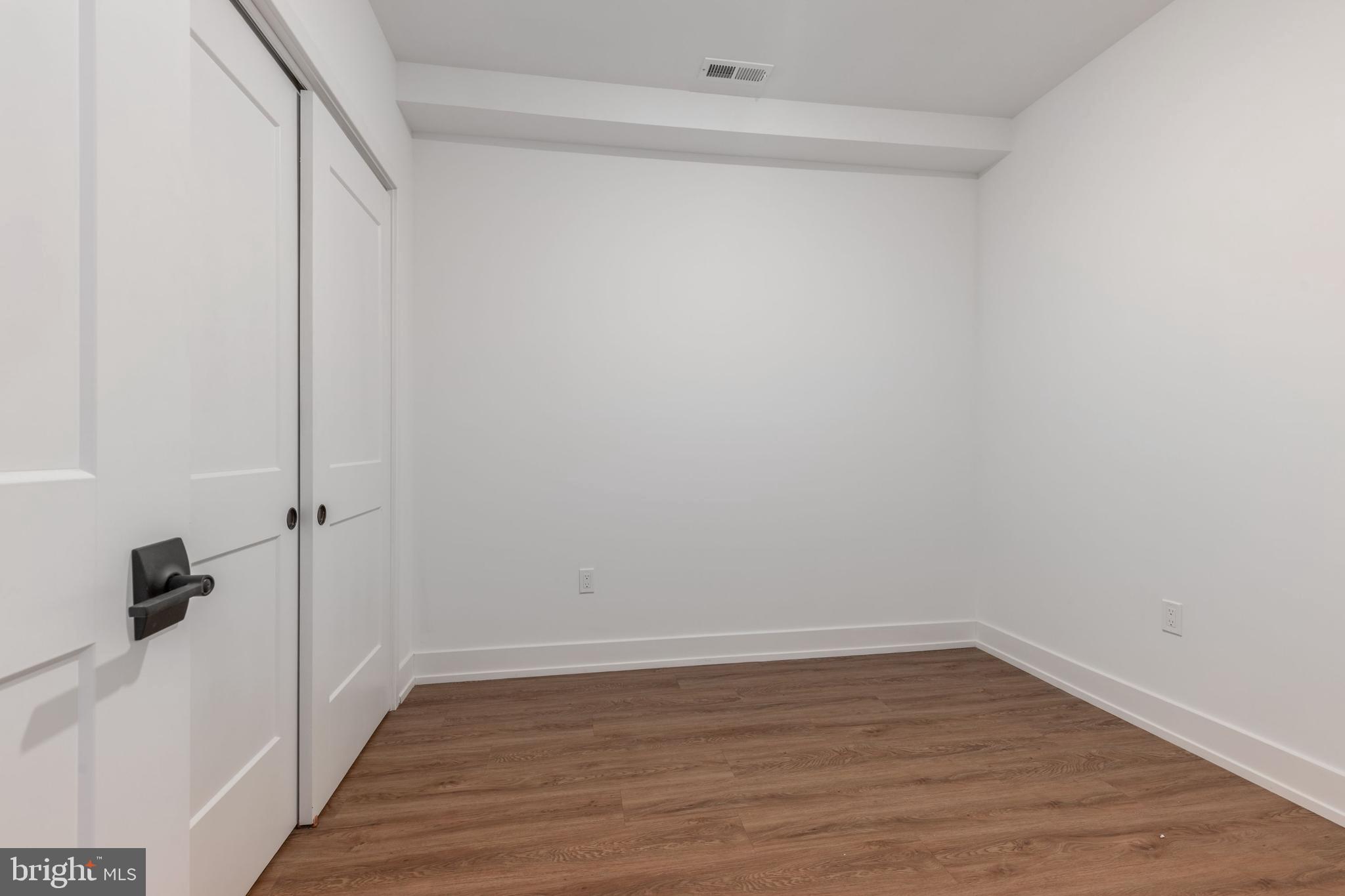 1519 Ridge Avenue, Unit 503 Philadelphia, PA 19130 - Photo 29 of 40 a view of a room with wooden floor