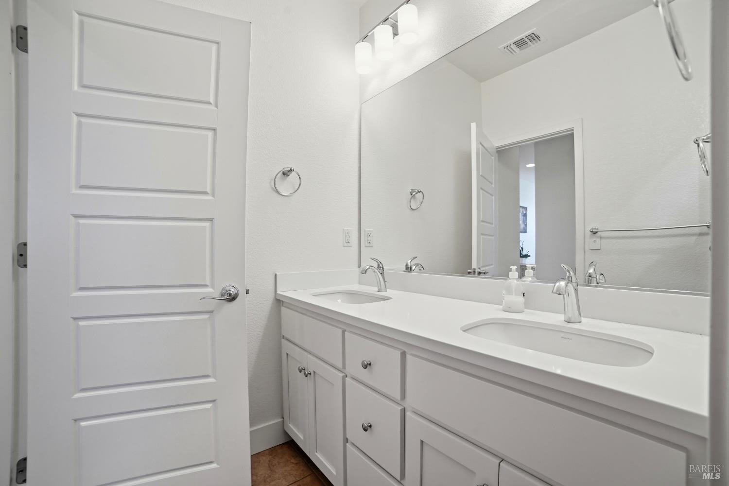 5305 Kirby Place Rohnert Park, CA 94928 - Photo 20 of 37 a bathroom with a sink and a mirror