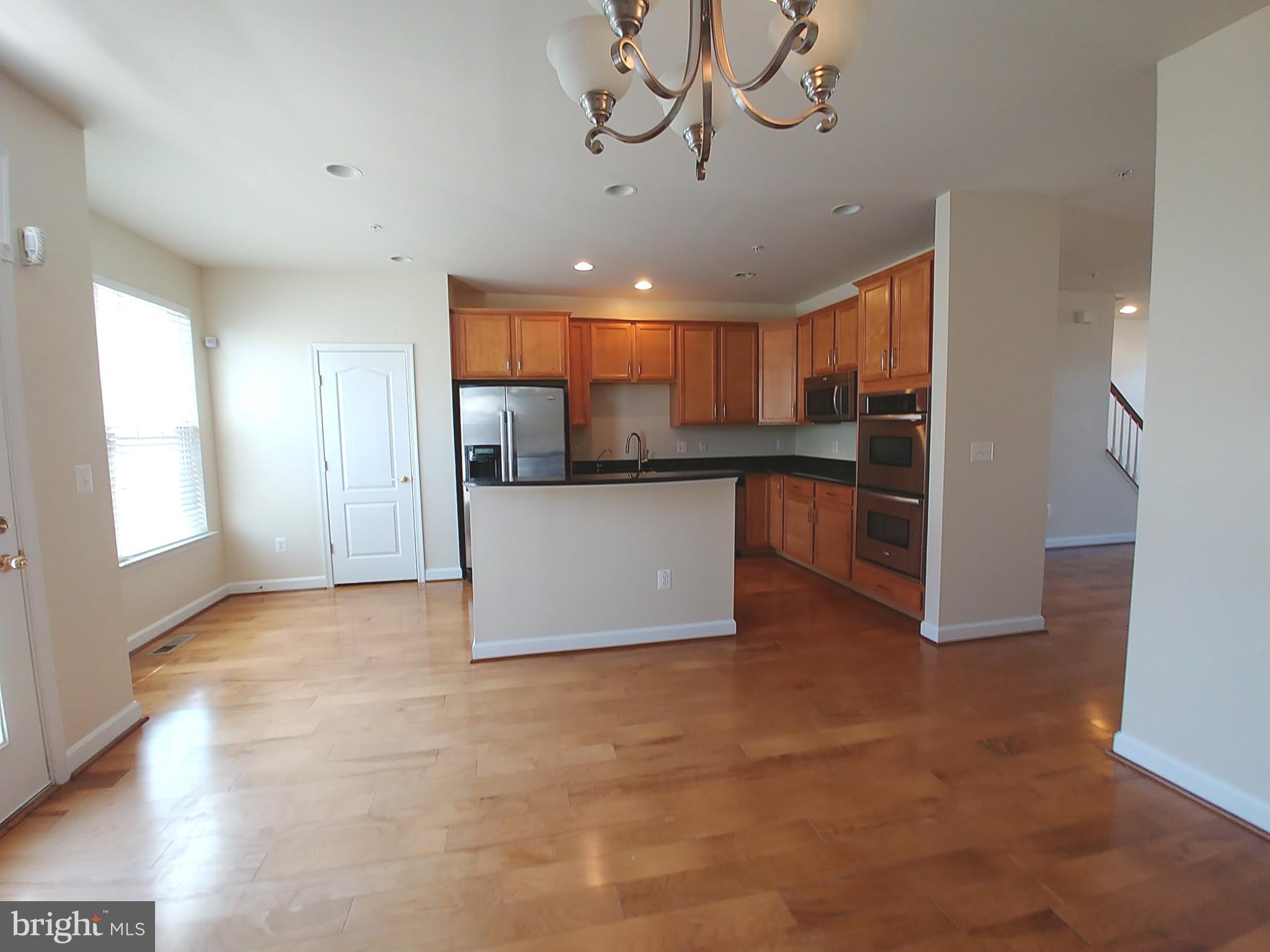 8007 Sport View Road Landover, MD 20785 - Photo 7 of 12 a view of a kitchen with a sink and cabinets
