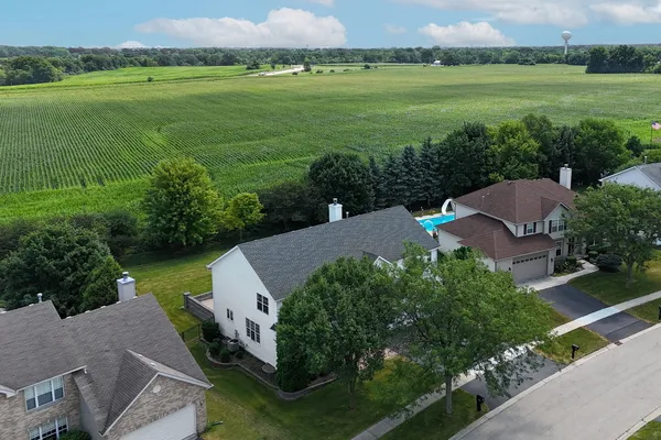 an aerial view of a house with garden