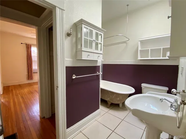 a bathroom with a double vanity sink and mirror