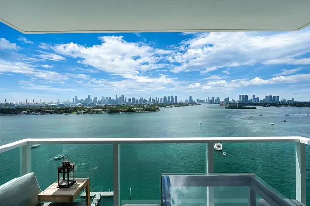 a view of a lake from a balcony