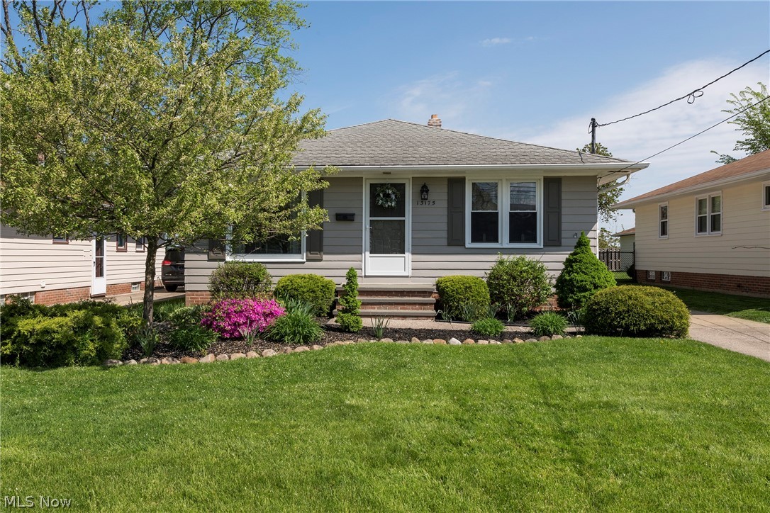 13175 McCracken Road Cleveland, OH 44125 - Photo 46 of 48 View of front of house featuring a front lawn