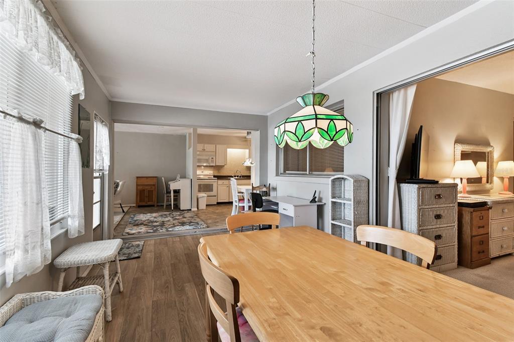 250 Rosery Road Northwest, Unit 333 Largo, FL 33770 - Photo 13 of 63 a living room with fireplace furniture and a flat screen tv