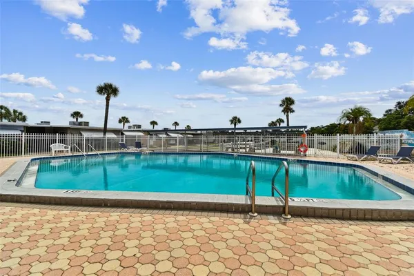 a large kitchen with stainless steel appliances granite countertop lots of counter top space