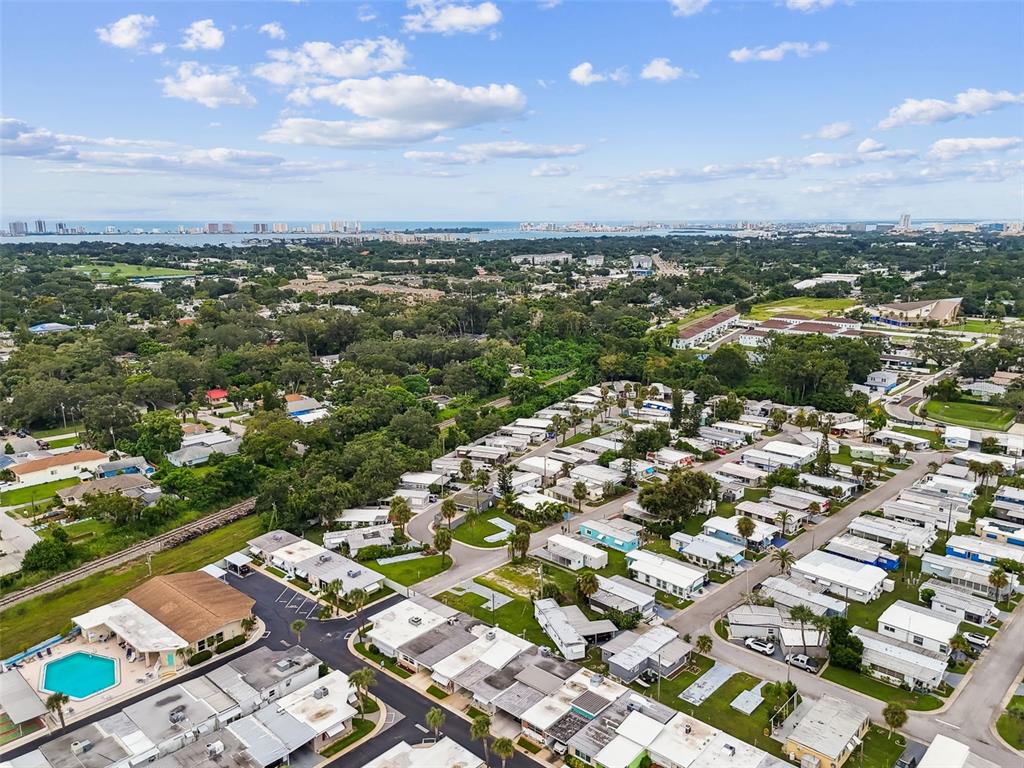 250 Rosery Road Northwest, Unit 333 Largo, FL 33770 - Photo 59 of 63 an aerial view of a city with lots of residential buildings