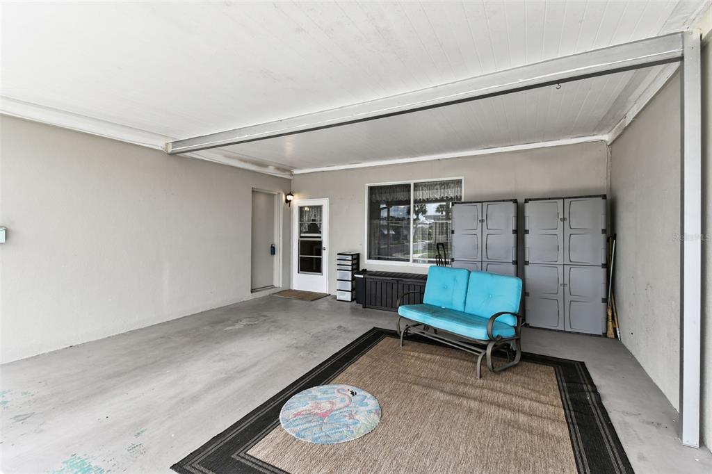 250 Rosery Road Northwest, Unit 333 Largo, FL 33770 - Photo 6 of 63 a living room with furniture and a wooden floor
