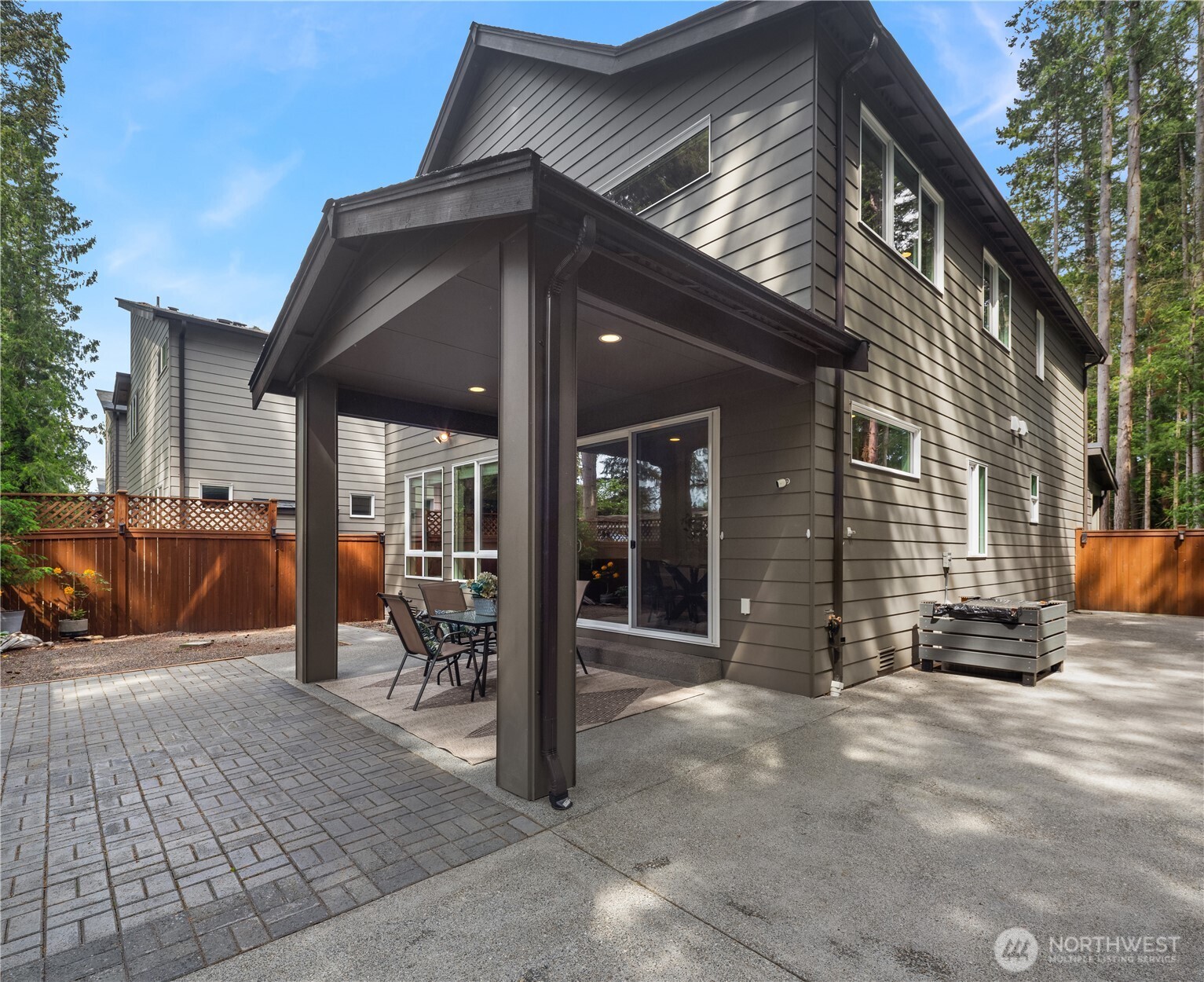 22308 17th Avenue West, Unit 12 Bothell, WA 98021 - Photo 15 of 33 a view of a house with a patio
