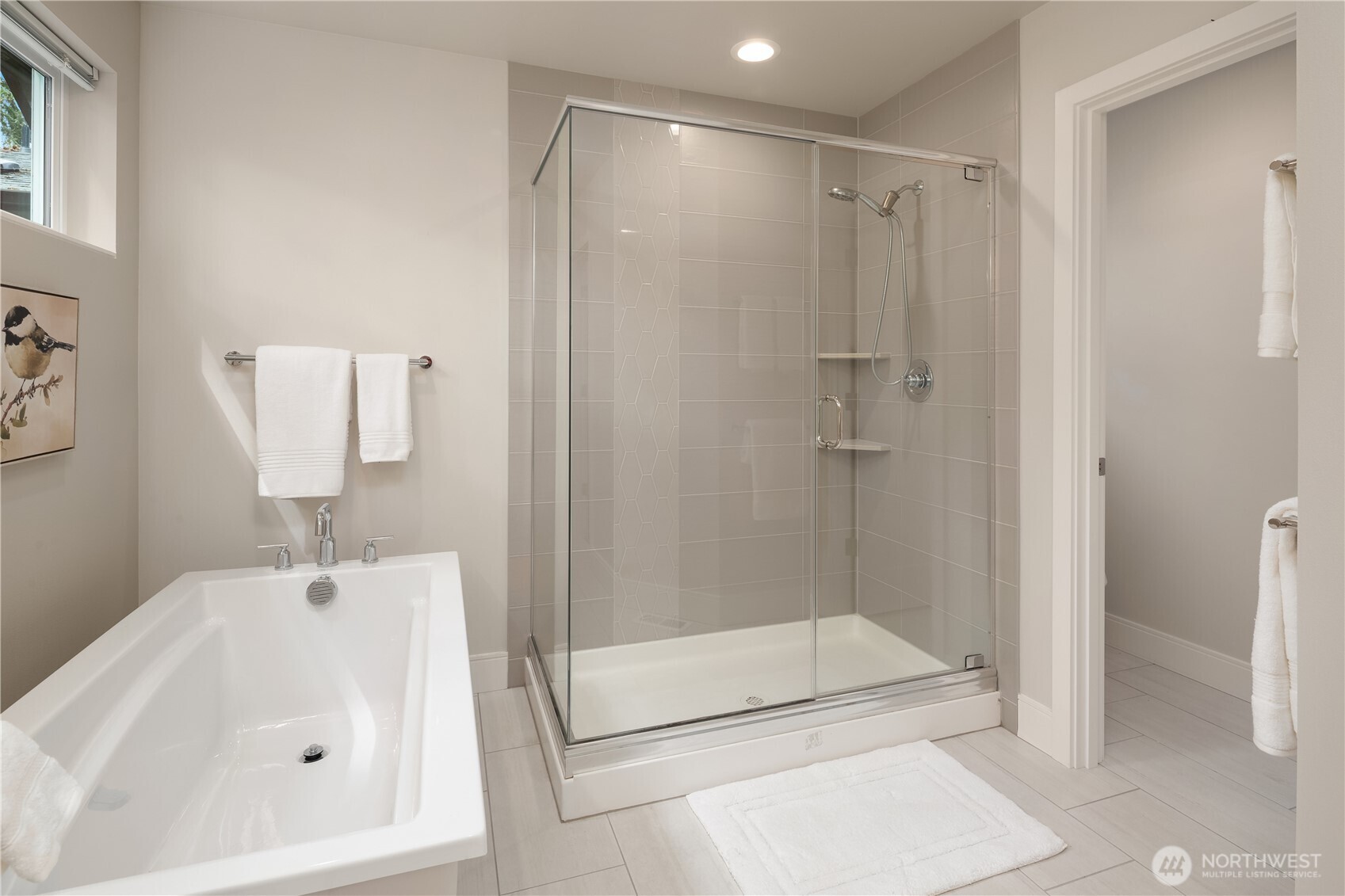 22308 17th Avenue West, Unit 12 Bothell, WA 98021 - Photo 25 of 33 a bathroom with a shower and a sink