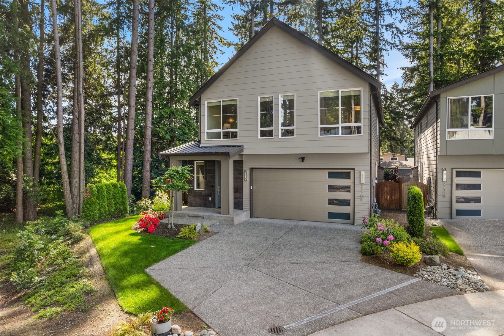 22308 17th Avenue West, Unit 12 Bothell, WA 98021 - Photo 3 of 33 front view of a house with a yard