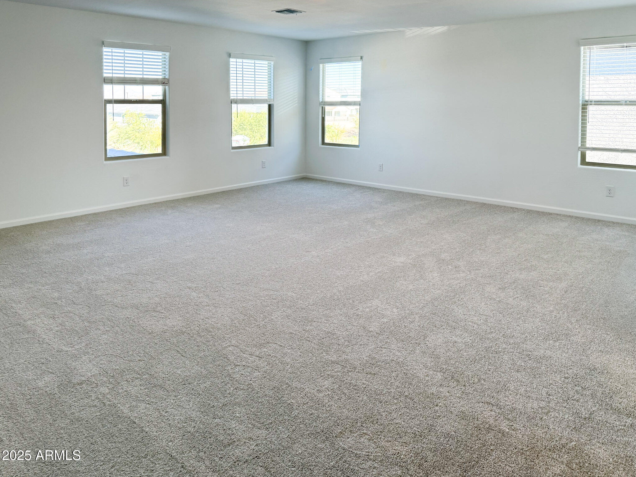 18203 La Senda Drive West Surprise, AZ 85387 - Photo 11 of 43 an empty room with windows