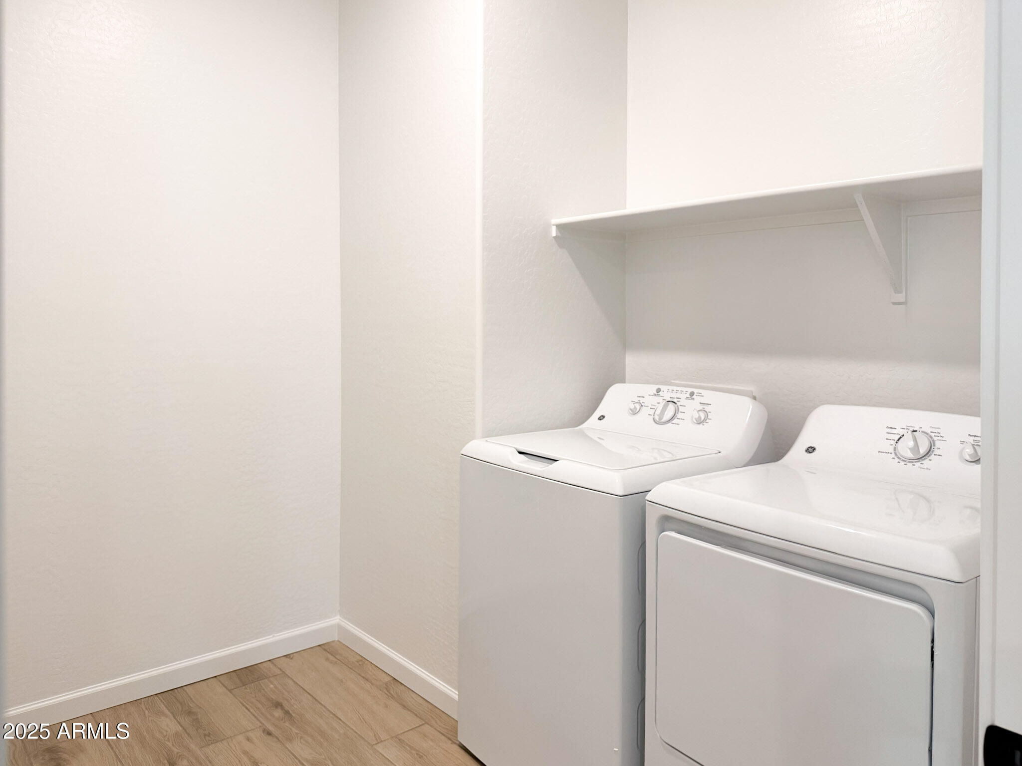 18203 La Senda Drive West Surprise, AZ 85387 - Photo 10 of 43 a utility room with dryer and washer