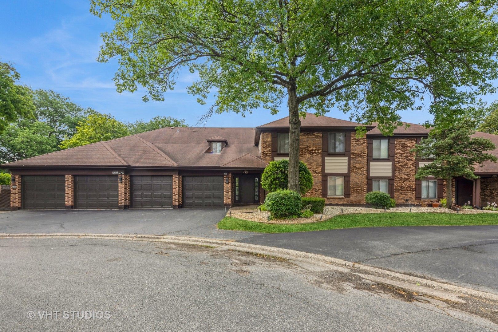 3241 West 184th Street, Unit 2B Homewood, IL 60430 - Photo 2 of 11 a front view of house with yard and green space