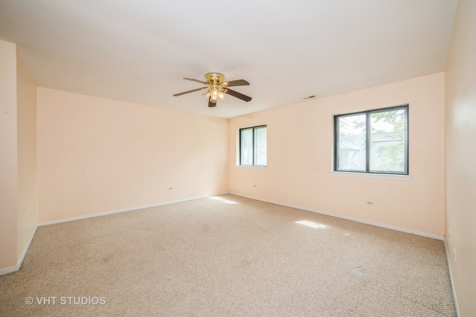 3241 West 184th Street, Unit 2B Homewood, IL 60430 - Photo 9 of 11 an empty room with windows and fan