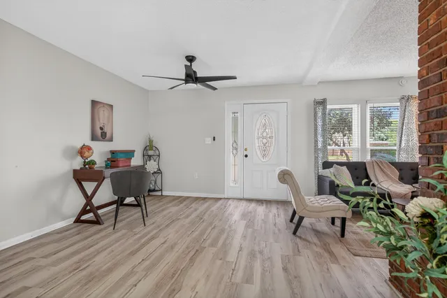a bathroom with a sink vanity and a mirror