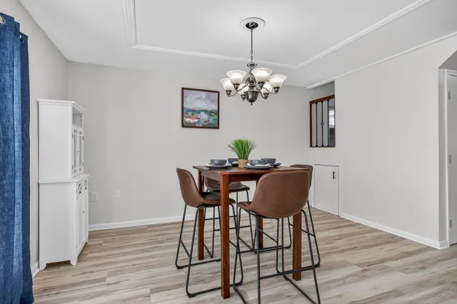 a kitchen with cabinets a sink and appliances