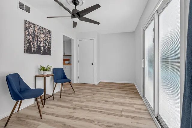a kitchen with stainless steel appliances a refrigerator and a stove top oven