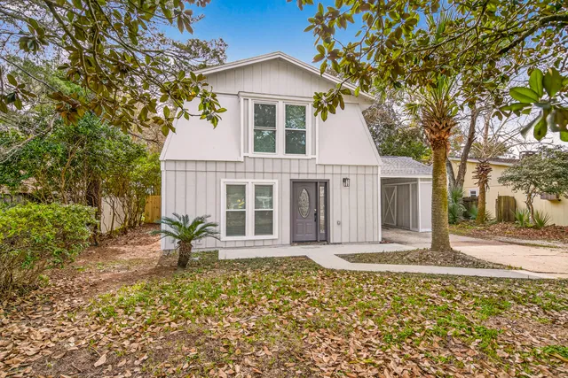 front view of a house with a yard