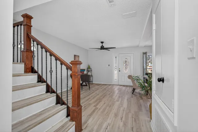 a bedroom with a bed and a desk