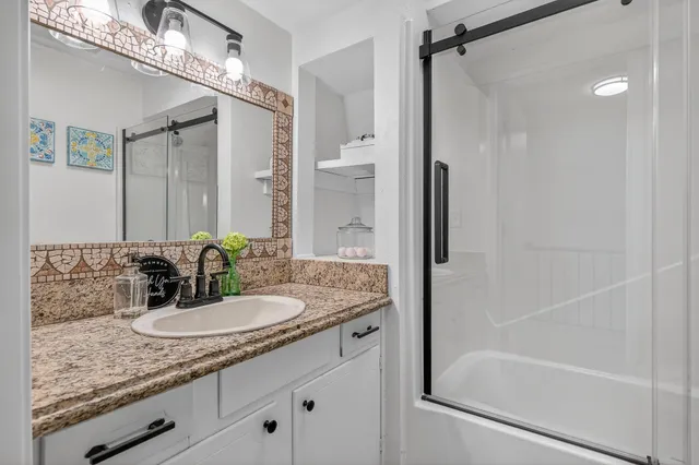 a view of a swimming pool with a patio