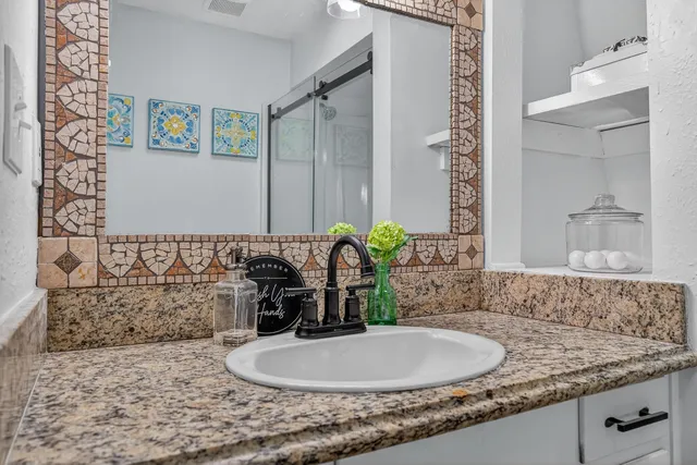 a view of a house with swimming pool and a yard