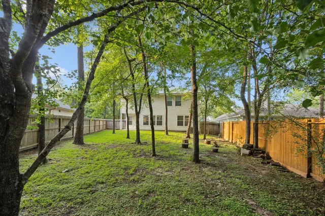 a view of park with trees