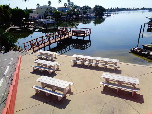a view of a ocean with sitting area